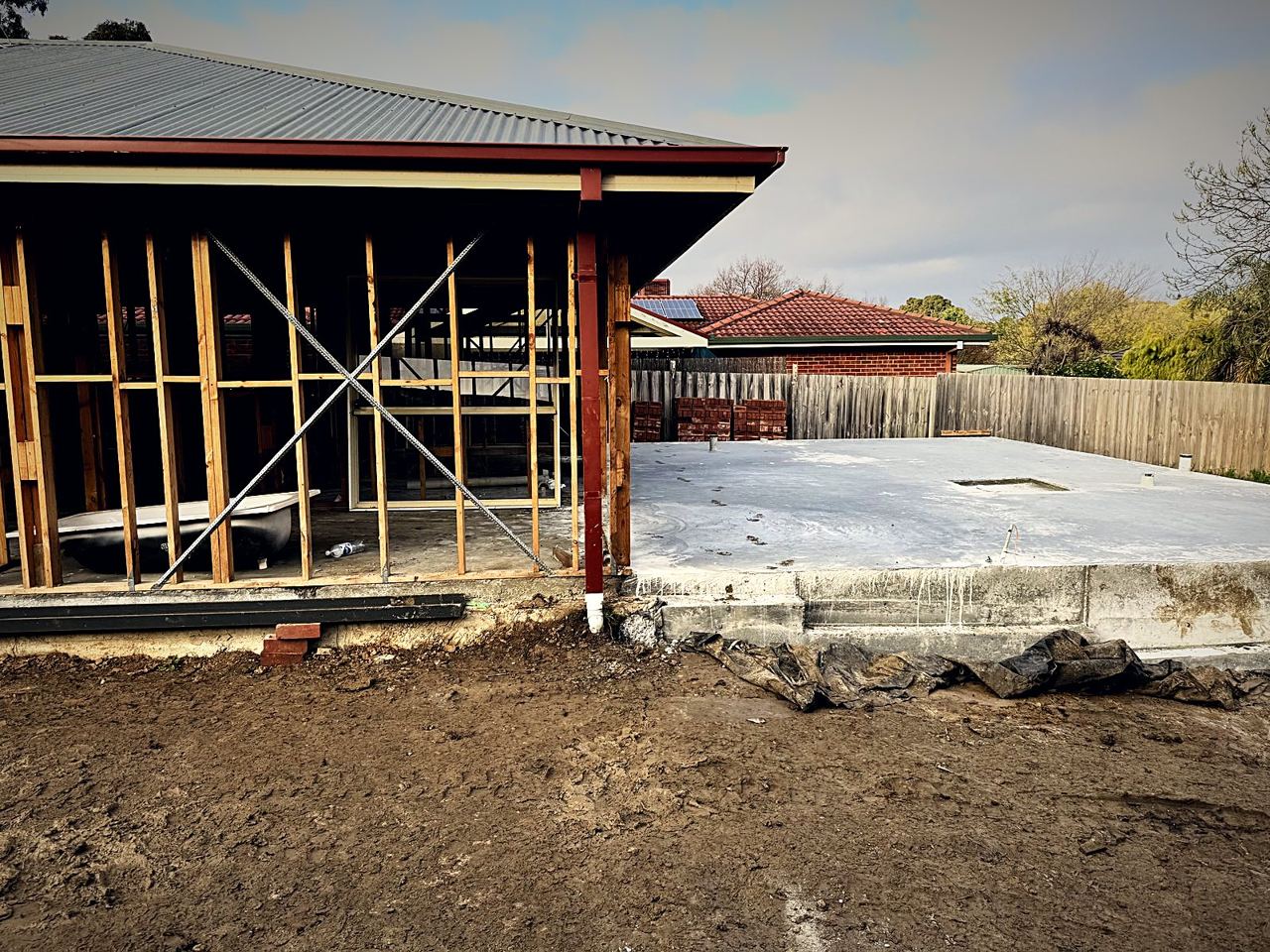 Framing and slab for a house extension