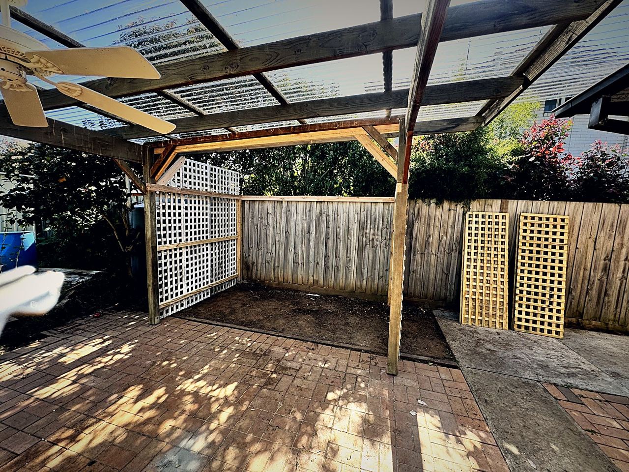 Timber pergola with lattice screens, built by Hamcon Pty Ltd